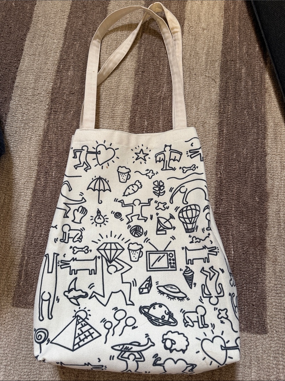 Keith Haring Canvas Tote Bag in white with Black Doodle Print - 17”x11”.